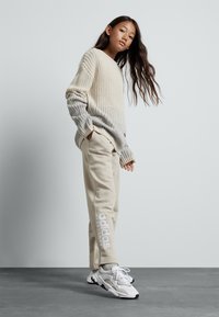 pantalon adidas femme blanc