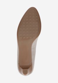 High-heeled shoe sole in light beige with embossed logo pattern, smooth finish, rounded toe design, and textured heel accent.