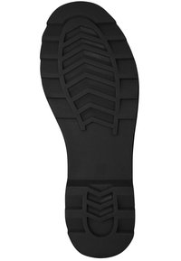 Semelle en caoutchouc noir avec des rainures profondes et un motif de chevron, taille 38 marquée au centre.