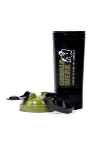 Zwarte shakerbeker met groene dop, voorzien van het "GORILLA WEAR" logo in wit en groen. Inclusief groene deksel en zwarte menginzet. Gladde oppervlakte.