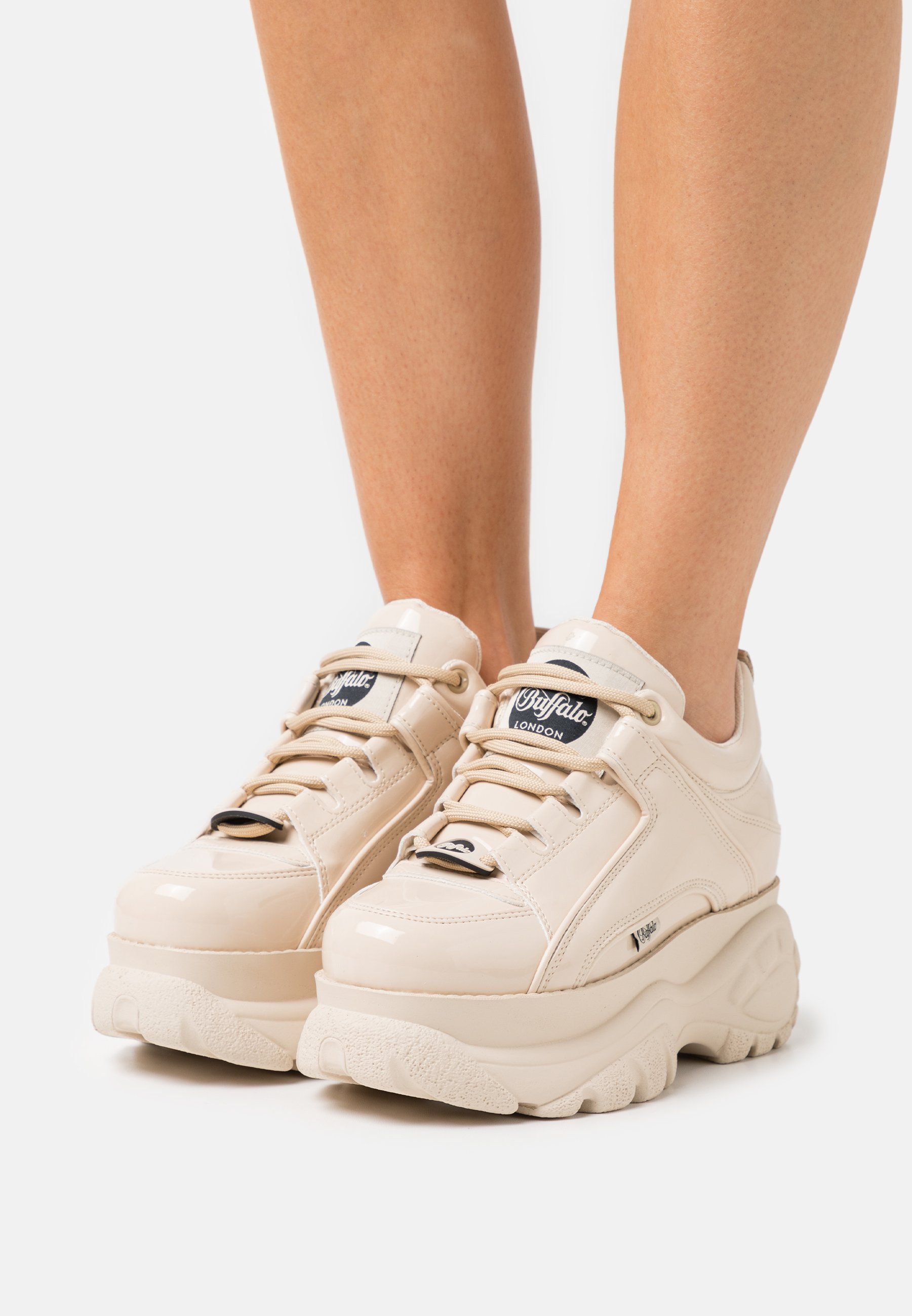 beige buffalo trainers