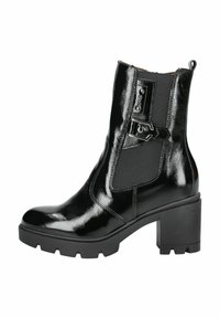 Bottine en cuir verni noir avec un talon chunky, un panneau latéral élastique et une sangle décorative avec une boucle en métal. Semelle texturée.