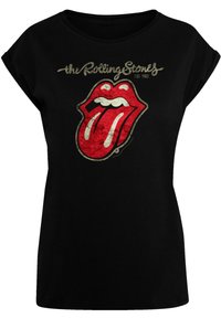 Zwarte t-shirt met een rood en wit Rolling Stones-logo met een tongontwerp. Korte, losse mouwen; ontspannen pasvorm; zachte stof.
