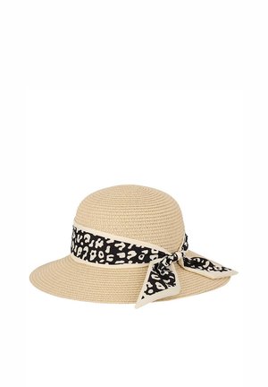 Beige wide-brimmed woven sun hat with a black and white animal-print ribbon tied in a bow around the crown.