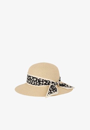 Beige wide-brimmed woven sun hat with a black and white animal-print ribbon tied in a bow around the crown.