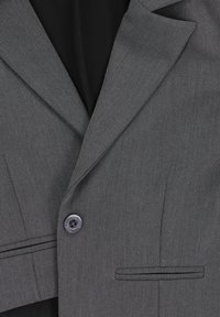 Grijze textuur blazer met een geknipte revers, sluiting met één knop en een paspelzak. Heeft subtiele diagonale strepen.