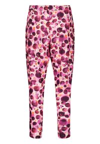 Colorful pants made of lightweight fabric featuring a pink background with large purple and orange polka dots. Elastic waistband for comfort.