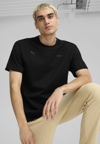 Puma AMG STATEMENT - Camiseta estampada - black