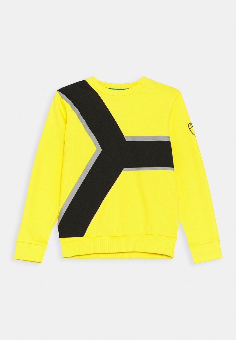 Yellow sweatshirt with a black and gray geometric design across the front. Features long sleeves and a rounded neckline. Soft fabric texture.