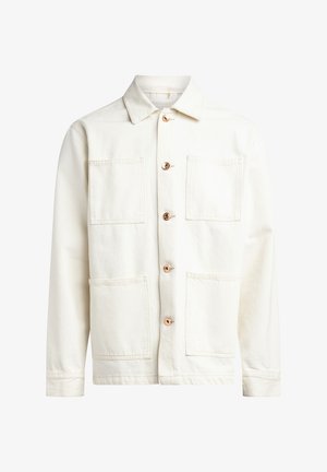 Witte denim jas met een kraag, een sluiting met knopen aan de voorkant en twee grote borstzakken. Heeft zichtbare stiksels en roségouden knopen.