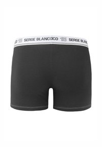 Boxer en coton noir avec une ceinture élastique blanche portant l'inscription "SERGE BLANCO" et le numéro "15".
