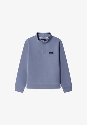 Sudadera morado claro con cuello alto, cierre frontal de media cremallera y puños acanalados. Cuenta con un parche de logo en el pecho.