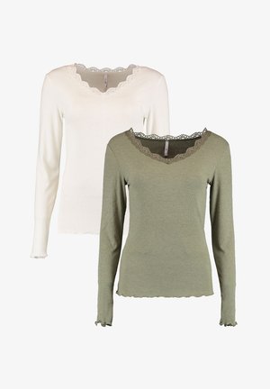 Two long-sleeve tops: one white and one olive green. Both feature a scalloped lace neckline and ribbed texture with frilled cuffs.