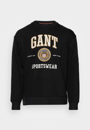 Zwarte sweatshirt van katoen, met de tekst "GANT" en "SPORTSWEAR" in wit en goud, een ronde halslijn en ribgebreide mouwen.