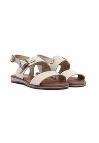 Sandali in pelle beige con punta aperta, multiple cinghie incrociate e cinturino regolabile alla caviglia. Suola in legno e soletta imbottita.