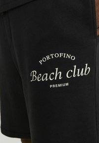 Jack & Jones PREMIUM Spodnji deli trenirk - schwarz