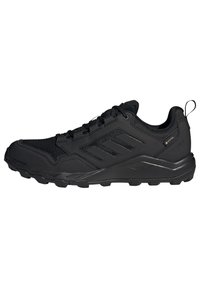 Czarne buty sportowe z siateczkowej cholewki, gumowej podeszwy i wypustkami zapewniającymi przyczepność. Posiadają trzy paski w designie oraz uchwyt na pięcie.