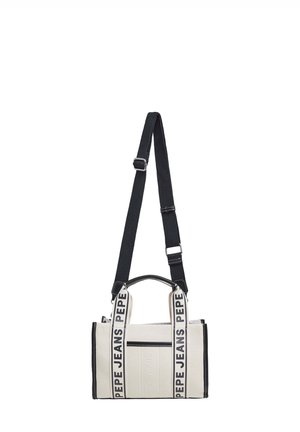 Kangas käsilaukku béžissä mustilla yksityiskohdilla, joka sisältää säädettävät hihnat ja kohokuvionnin logon. Suorakulmainen muoto, jossa ulkopuolinen vetoketjullinen tasku.