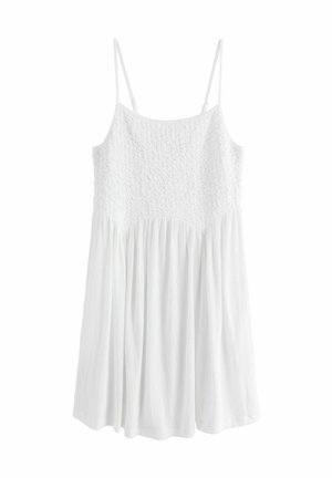 Weißes Kleid mit einem strukturierten Oberteil, Spaghetti-Trägern und einem fließenden Rock. Das Material ist leicht und leicht zerknittert.