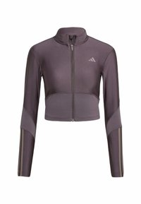 Beskuren atletisk jacka i mörklila med hög krage, hel dragkedja och långa ärmar. Har kontrasterande vertikala ränder längs ärmarna.