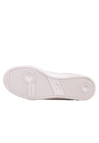 Biała podeszwa sportowego buta z teksturowanym sześciokątnym wzorem, okrągłymi akcentami i logo; zaprojektowana dla przyczepności i trwałości.