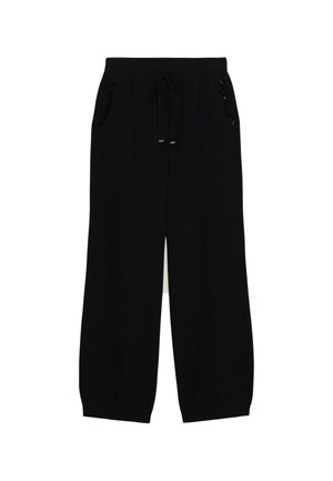 Zwarte wijde sweatpants met een trekkoord in de taille, twee zijzakken en textuuraccenten op de zakken. Zachte stof met een relaxte pasvorm.