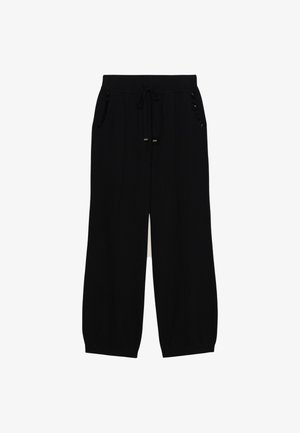 Svarta vida sweatpants med dragsko i midjan, två sidofickor och texturerade detaljer på fickorna. Mjuk tygkvalitet med en avslappnad passform.