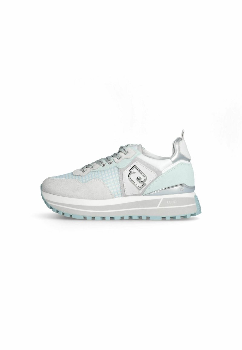 Light grey athletic shoe with textured suede and mesh. Features silver accents and a mint green sole, with a lace-up design and logo detail.