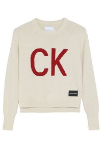 Krémový pletený svetr s červeným logem "CK" na přední straně, pružným výstřihem a manžetami a zkráceným střihem. Štítek přišitý na spodním lemu.