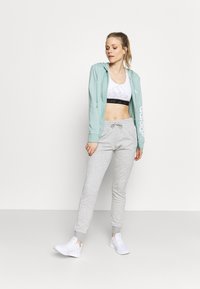 adidas Performance Treniņtērpa apakšdaļas - medium grey heather/white