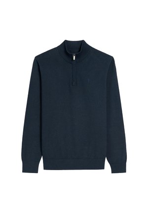 Granatowy sweter z długim rękawem, wykonany z miękkiego materiału, z zamkiem w wysokim kołnierzu oraz ribbowanym wykończeniem na mankietach i dolnym brzegu.