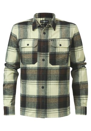 Rummede flannel skjorte med tern i ivory, brun og sort, to brystlommer og sorte knapper. Blød tekstur med lange ærmer.