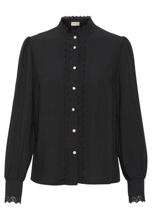 Blouse noire à manches longues, col haut, bordure en dentelle, boutons en perles, et détails en œillets complexes aux poignets et sur la patte de boutonnage centrale.