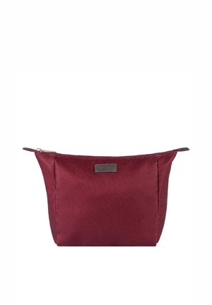 Small textured dark red zippered pouch with a rectangular label on front, shown against a white background.