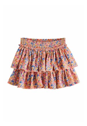 Pink tiered mini skirt with elastic waistband, featuring a colorful floral pattern in blue, orange, and green hues.
