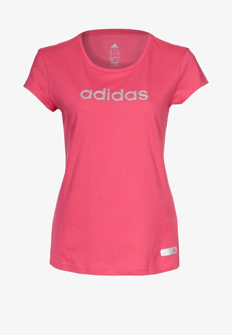 Pink short-sleeve t-shirt made of cotton with a crew neckline. Features silver "adidas" logo across the chest and a small tag on the bottom.