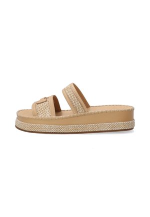 Tan platform sandals with two wide straps, woven detailing, and a jute-style rope midsole. Smooth leather upper and flat sole.