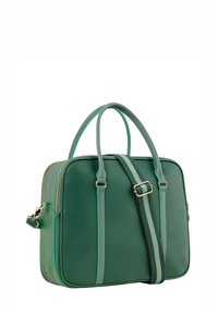 Green textured leather bag with dual handles, a detachable striped shoulder strap, and contrasting trim, featuring a zippered closure.