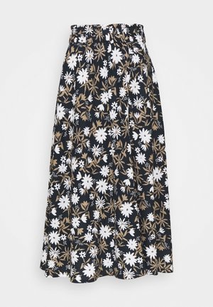 Jupe midi noire avec imprimé floral blanc et beige présentant de grandes et petites fleurs ainsi que des motifs feuillus.