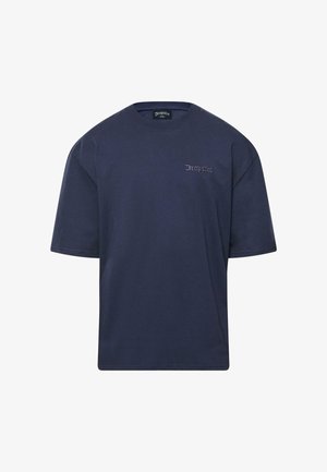 Marineblauwe katoenen t-shirt met korte mouwen, ronde halslijn en geborduurd merksymbool aan de linkerzijde. Zachte textuur, relaxte pasvorm.