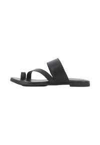 Sandalias de cuero negro tipo deslizante con dos tiras anchas y un lazo para el dedo del pie, con suela plana y acabado suave.