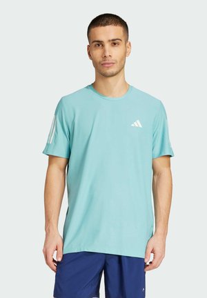 A light blue athletic t-shirt made of soft fabric, featuring a round neckline and three white accent stripes on each shoulder.