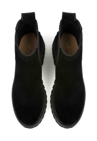 Black suede ankle boots with elastic side panels, rounded toe, and textured rubber sole. Features pull tabs at the heel for easy wear.