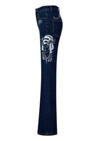Dark blue denim jeans with a fitted shape, featuring white embroidered design of a woman's face and floral accents on the left leg.