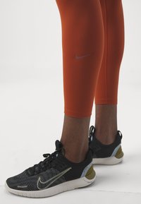 Nike Performance ONE - Leggings - burnt sunrise