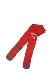 Czerwone sportowe skarpetki z białym napisem "ST. PAULI" i logo Pumy. Szare wyściełane podeszwy z teksturowanymi wzorami dla lepszej przyczepności.