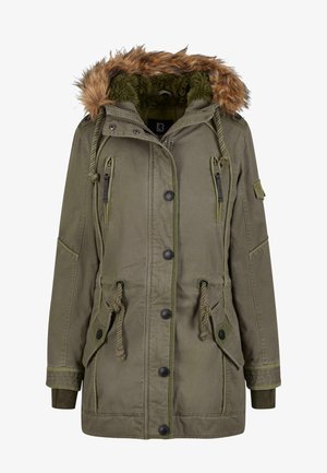 Parka olive avec une capuche en fourrure synthétique, des cordons de serrage, plusieurs poches et des fermetures à boutons. Présente des coutures ton sur ton.