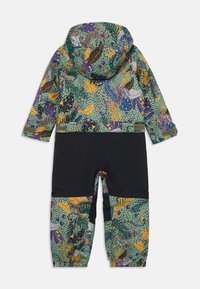 Șosetă pentru copii multicoloră, cu un partea superioară cu un model ce include elemente verzi, purpurii și galbene, și secțiuni inferioare negre uniforme.