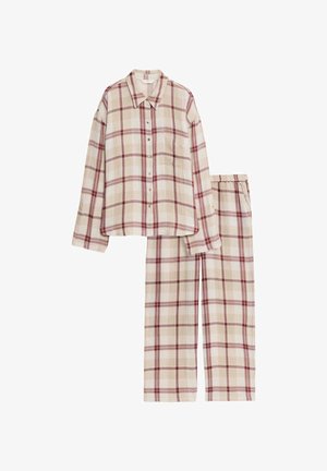 Rutet pyjamasæt i creme, rød og beige, der har en knaplukket skjorte med en brystlomme samt løse bukser med elastisk talje. 100% bomuldsstof.