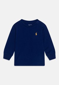 Námořnickomodré tričko s dlouhým rukávem z bavlny, s kulatým výstřihem, patentkami na rameni a malým vyšitým logem na hrudi.